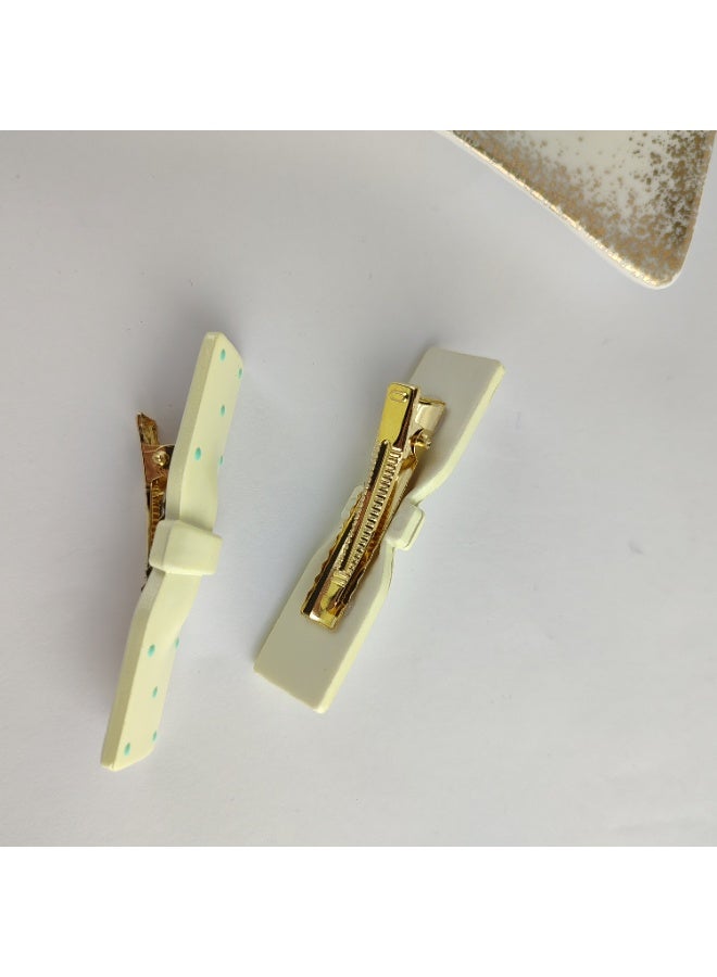 عرض 2 توكة شعر كلبس شكل فيونكات أنيقة – تصميم أنثوي وثبات مريح - Image 5